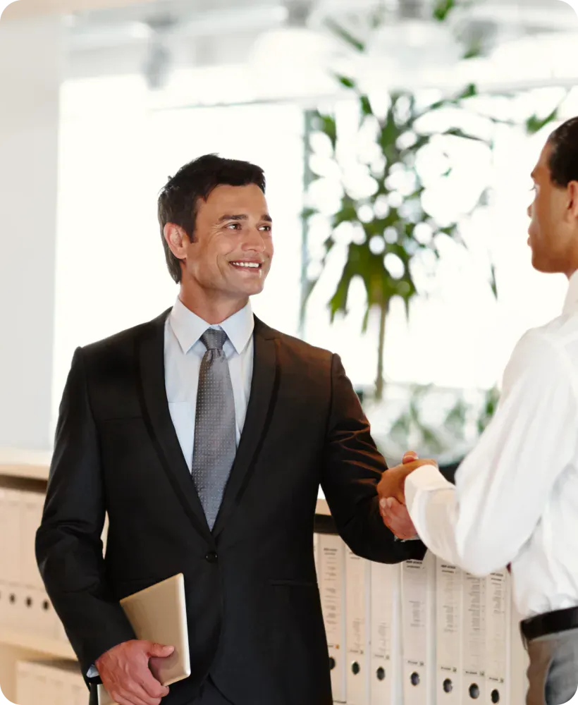 Two professionals shaking hands