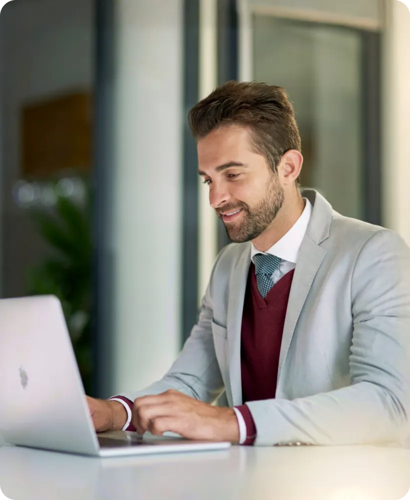 A lawyer working at a laptop